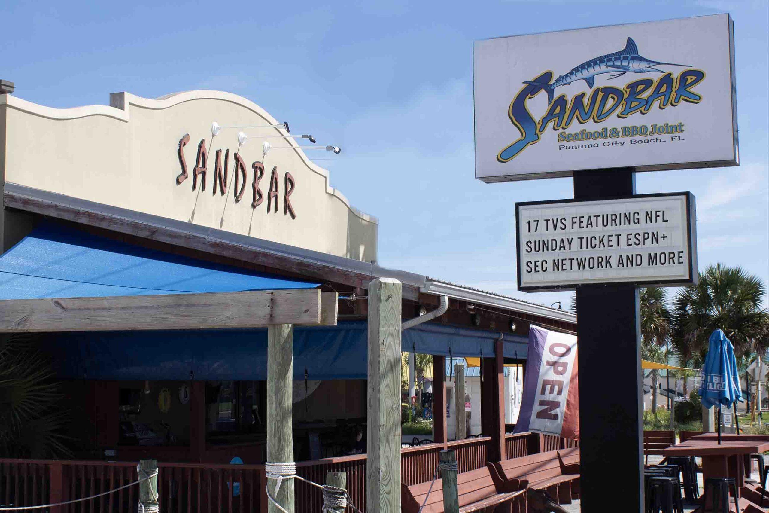 Sandbar seafood and BBQ bar in Panama City Beach with letterboard outside