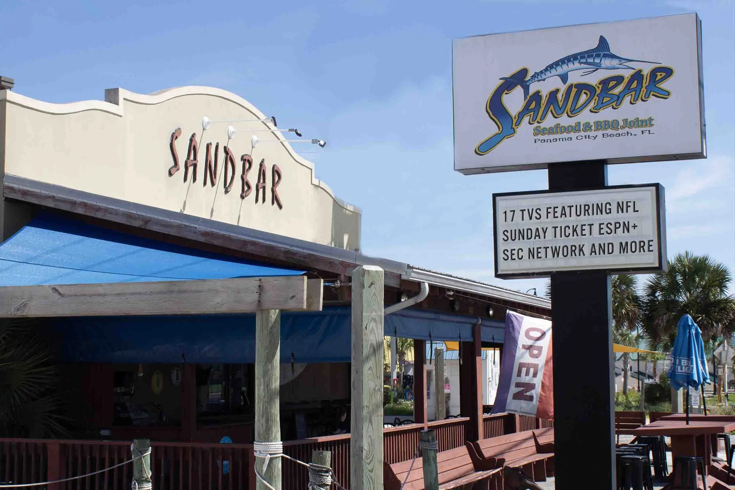 Sandbar seafood and BBQ bar in Panama City Beach with letterboard outside