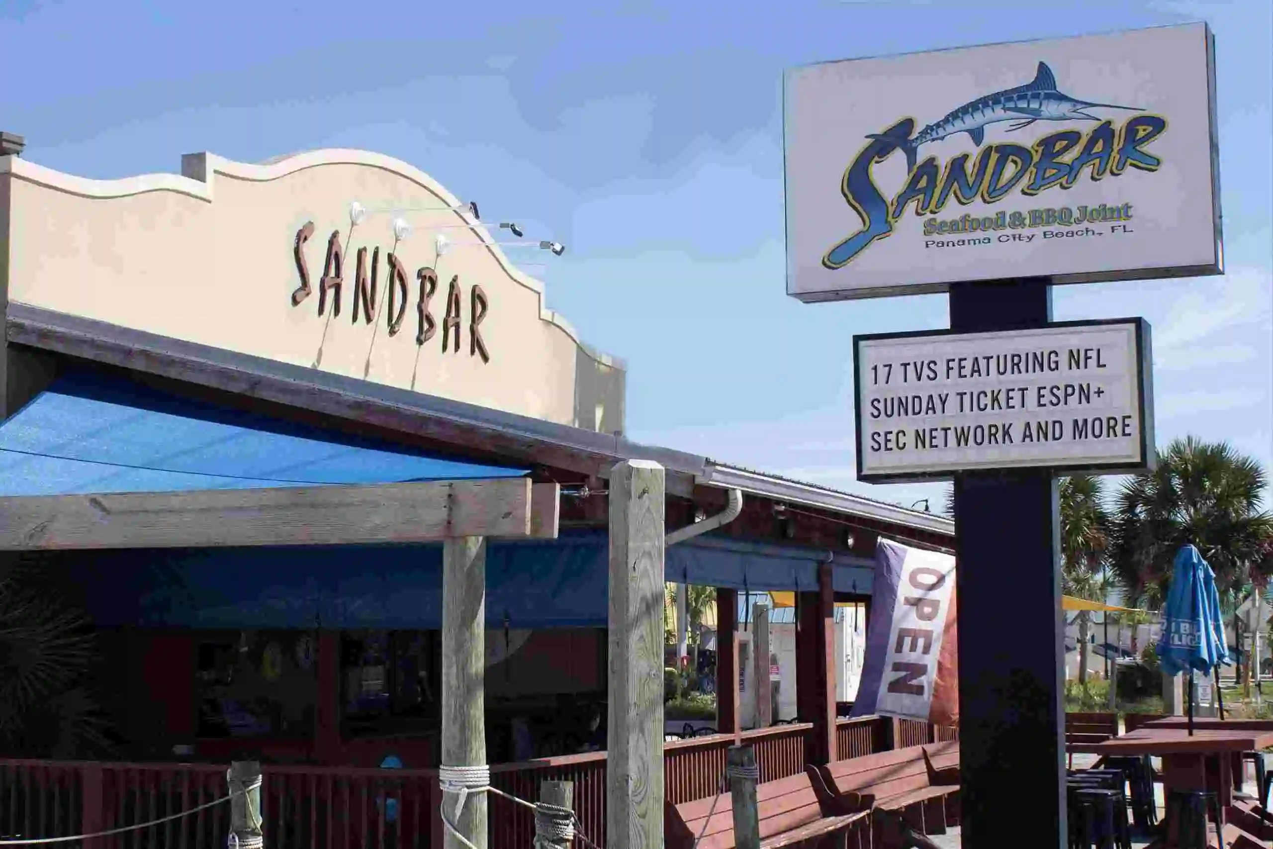 Sandbar seafood and BBQ bar in Panama City Beach with letterboard outside